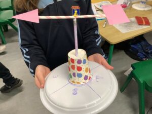 A pupil from St Olaf's National School in Dublin with their self-made wind gauge, build during a Met Éireann outreach visit