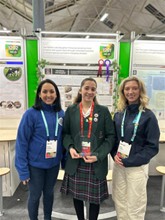 Naomi Picovici from St Leo's College, Carlow, winner of the inaugural Climate Change Innovation Award, alongside __ from the Climate Change Advisory Council, and Met Éireann meteorologist, Holly O'Neill at Stripe Young Scientist and Technology Exhibition
