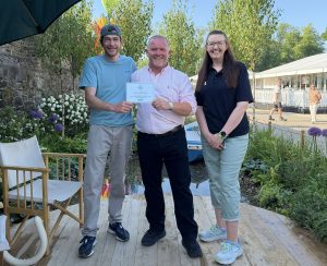 Left to right: Designers Padraic Woods and Paul Dunne, with Met Éireann Education and Outreach Officer, Gráinne Connolly, with their Silver Gilt Medal award at Bord Bia Bloom 2026